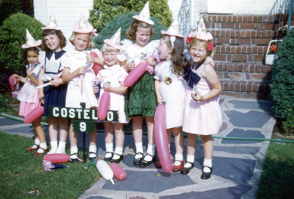My sister's fifth birthday party. Outside our house in Green Acres.