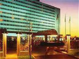 We were to meet Cal's guy in one of the big glitzy motels just across the Belt Parkway from JFK Airport.