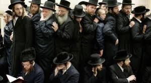 Bending forward at the waist, and straightening, bending and straightening, over and over, moving their lips in prayer, bobbing up and down. Hundreds of them. It was hypnotic. 