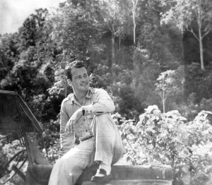 Lt.Al sitting on his Jeep. Planning his next move against the Japs. Papua New Guinea 1944