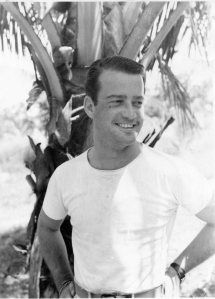 Lt. Al flexing his muscles after beating up on Tojo and his boys - Occupied Japan 1945